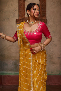 Kanak – Mustard Yellow Leheriya Saree and Rani Pink Blouse