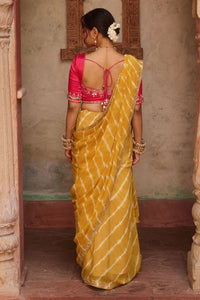 Kanak – Mustard Yellow Leheriya Saree and Rani Pink Blouse