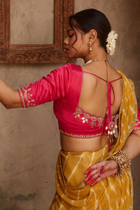 Kanak – Mustard Yellow Leheriya Saree and Rani Pink Blouse