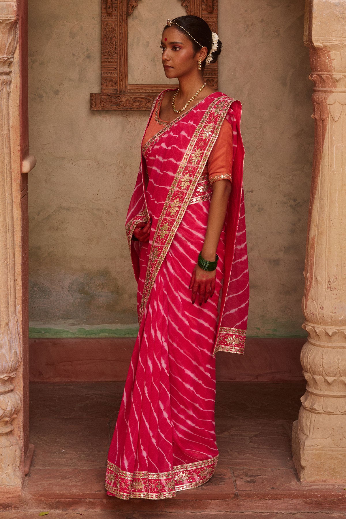 Gulnar – Rani Pink Leheriya Saree with Terracotta Blouse