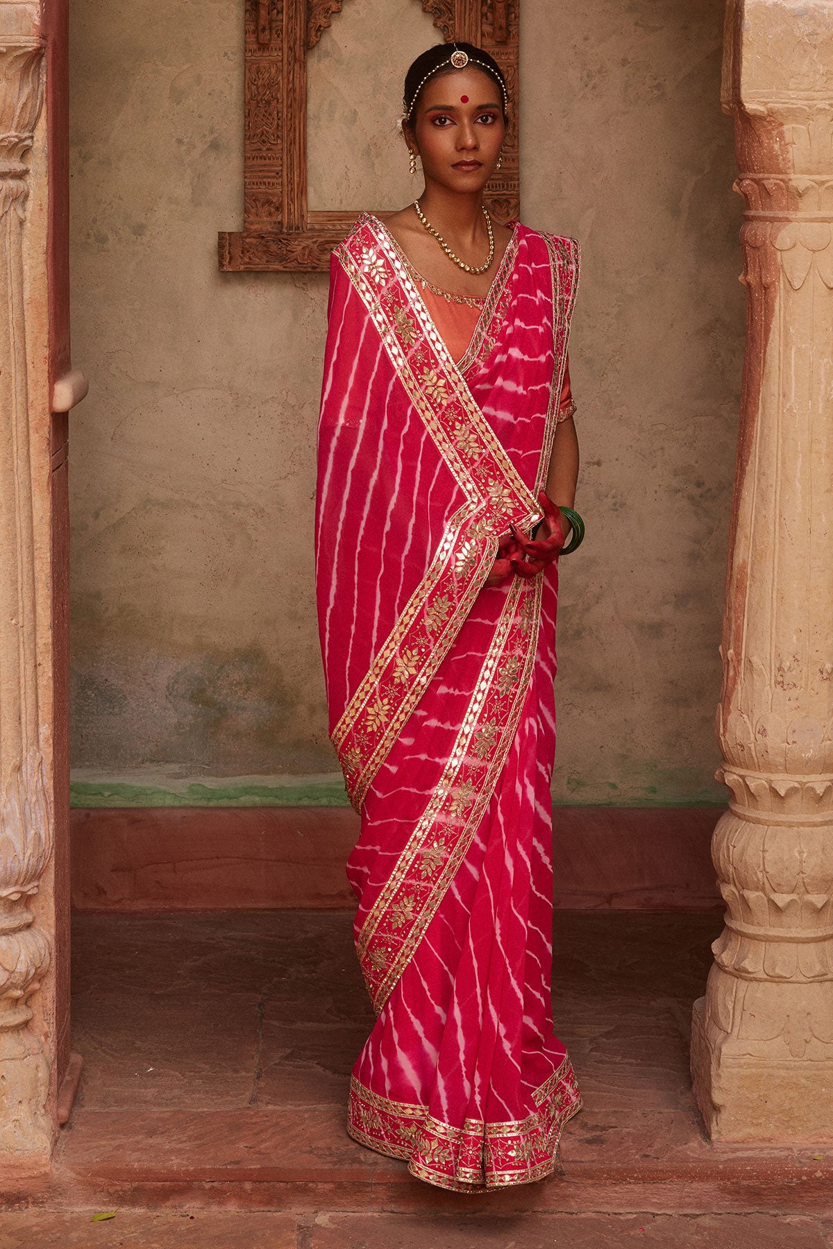 Gulnar – Rani Pink Leheriya Saree with Terracotta Blouse