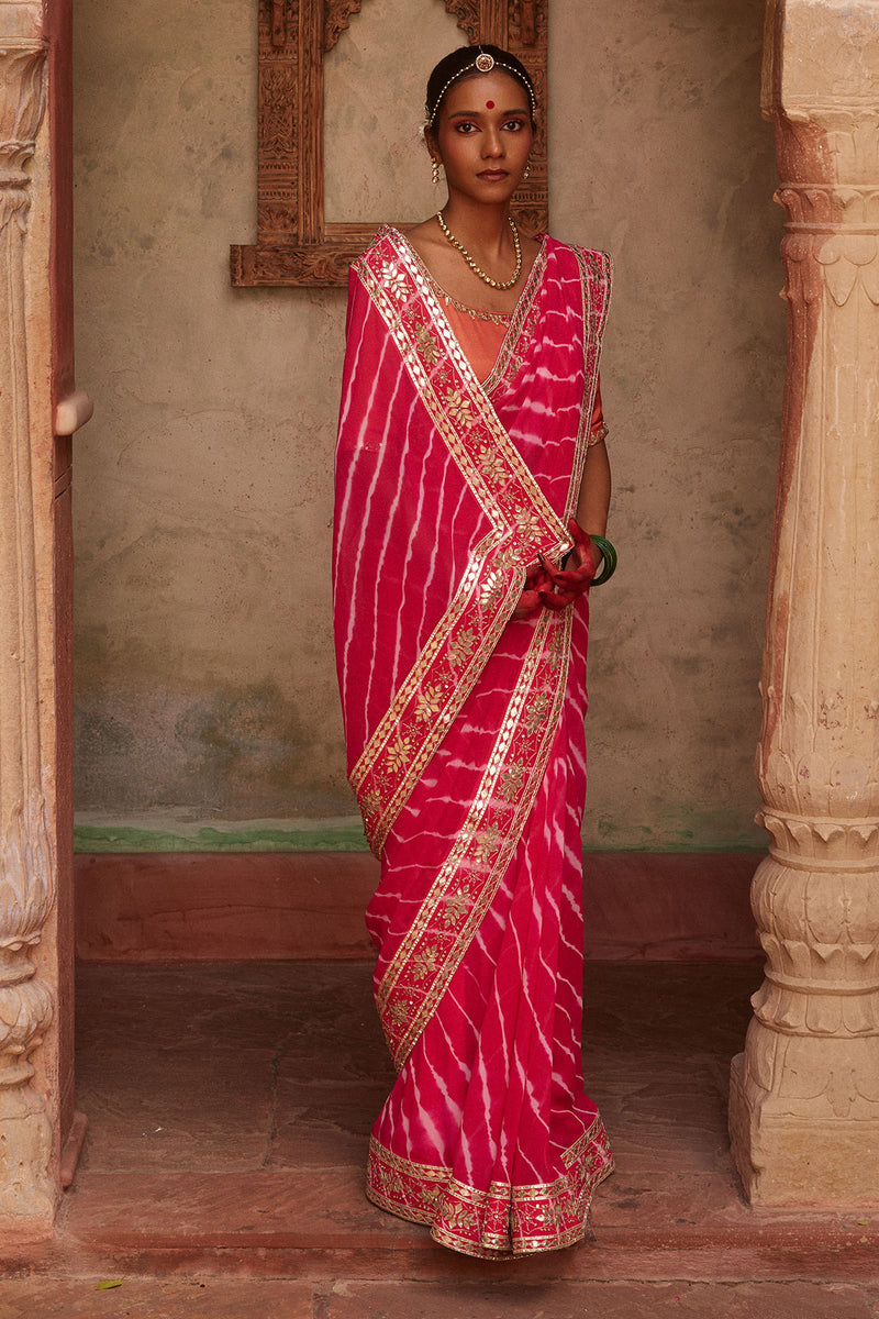 Gulnar – Rani Pink Leheriya Saree with Terracotta Blouse