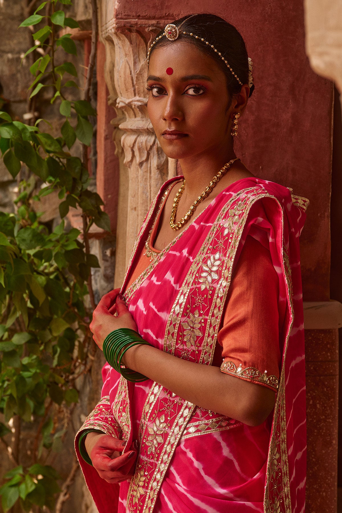 Gulnar – Rani Pink Leheriya Saree with Terracotta Blouse