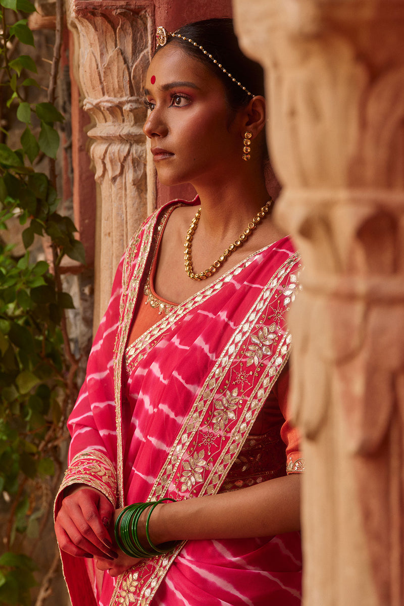 Gulnar – Rani Pink Leheriya Saree with Terracotta Blouse