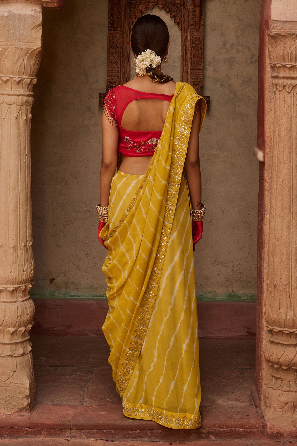 Paalki – Ray Flower Yellow Leheriya Saree with Red Palanquin  Blouse