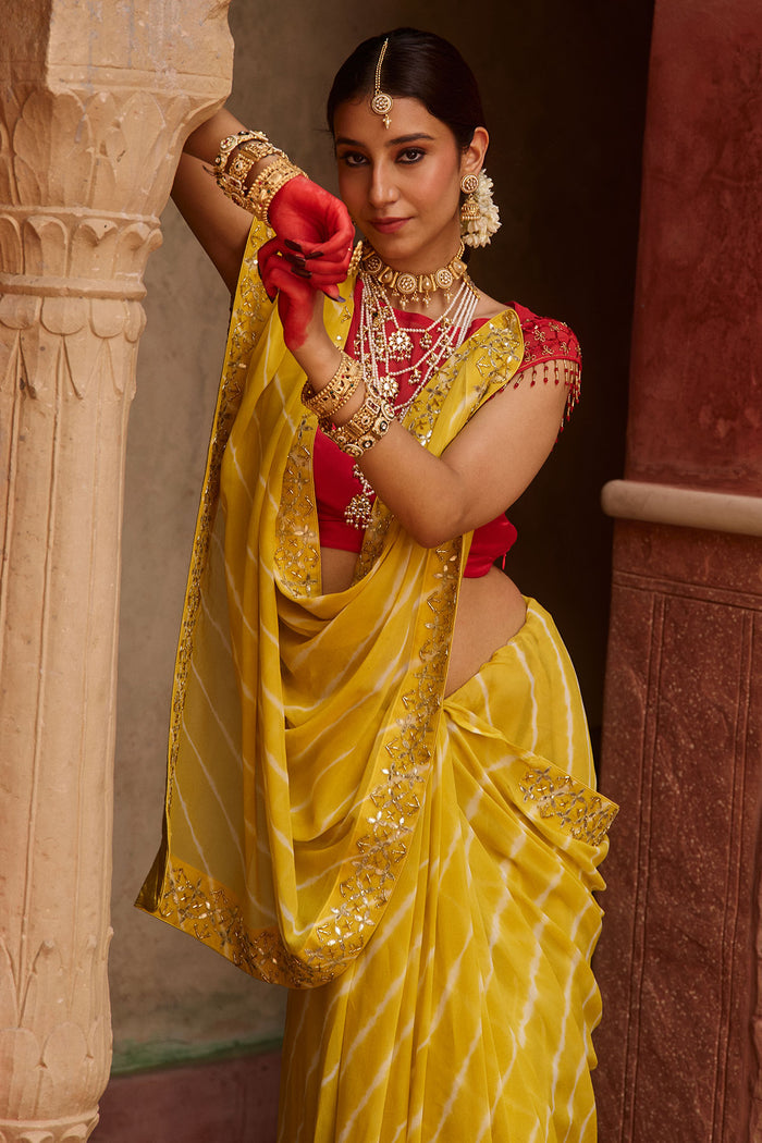 Paalki – Ray Flower Yellow Leheriya Saree with Red Palanquin  Blouse