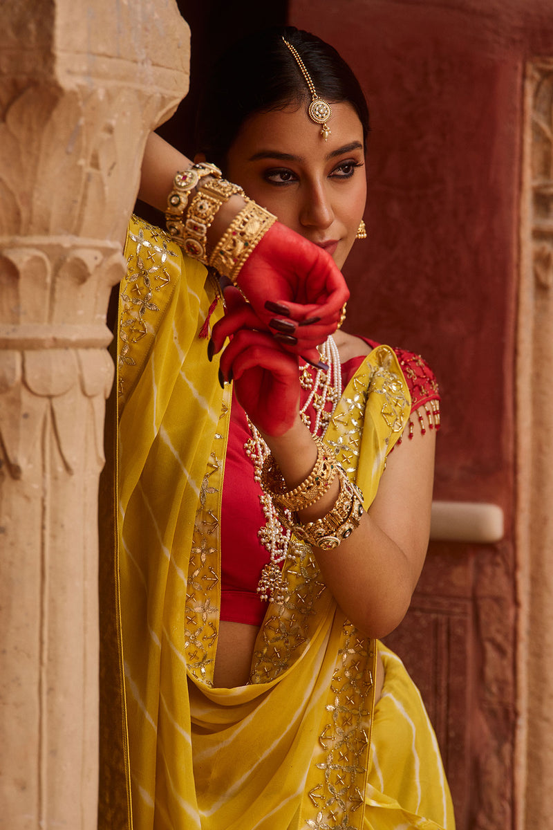 Paalki – Ray Flower Yellow Leheriya Saree with Red Palanquin  Blouse