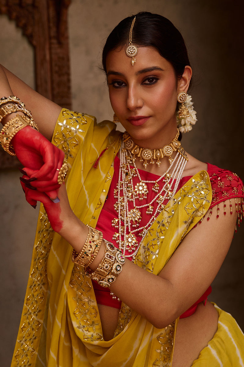 Paalki – Ray Flower Yellow Leheriya Saree with Red Palanquin  Blouse