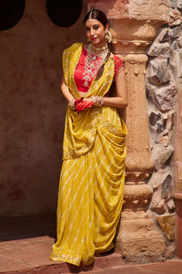 Paalki – Ray Flower Yellow Leheriya Saree with Red Palanquin  Blouse