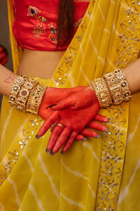 Paalki – Ray Flower Yellow Leheriya Saree with Red Palanquin  Blouse