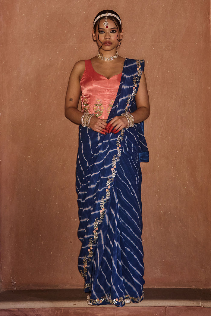 Roopmati – Navy Blue Leheriya Saree with Peach Corset Blouse