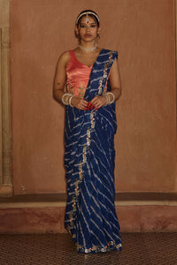 Roopmati – Navy Blue Leheriya Saree with Peach Corset Blouse