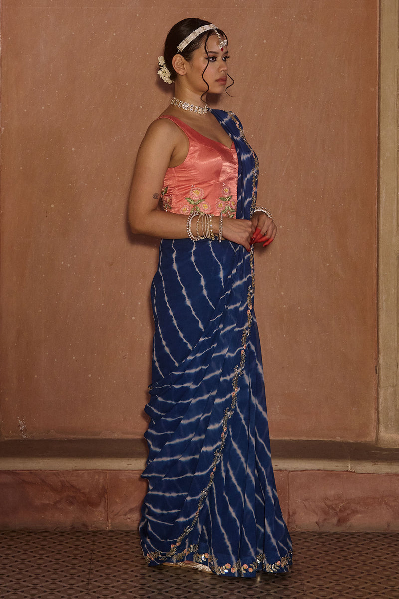 Roopmati – Navy Blue Leheriya Saree with Peach Corset Blouse