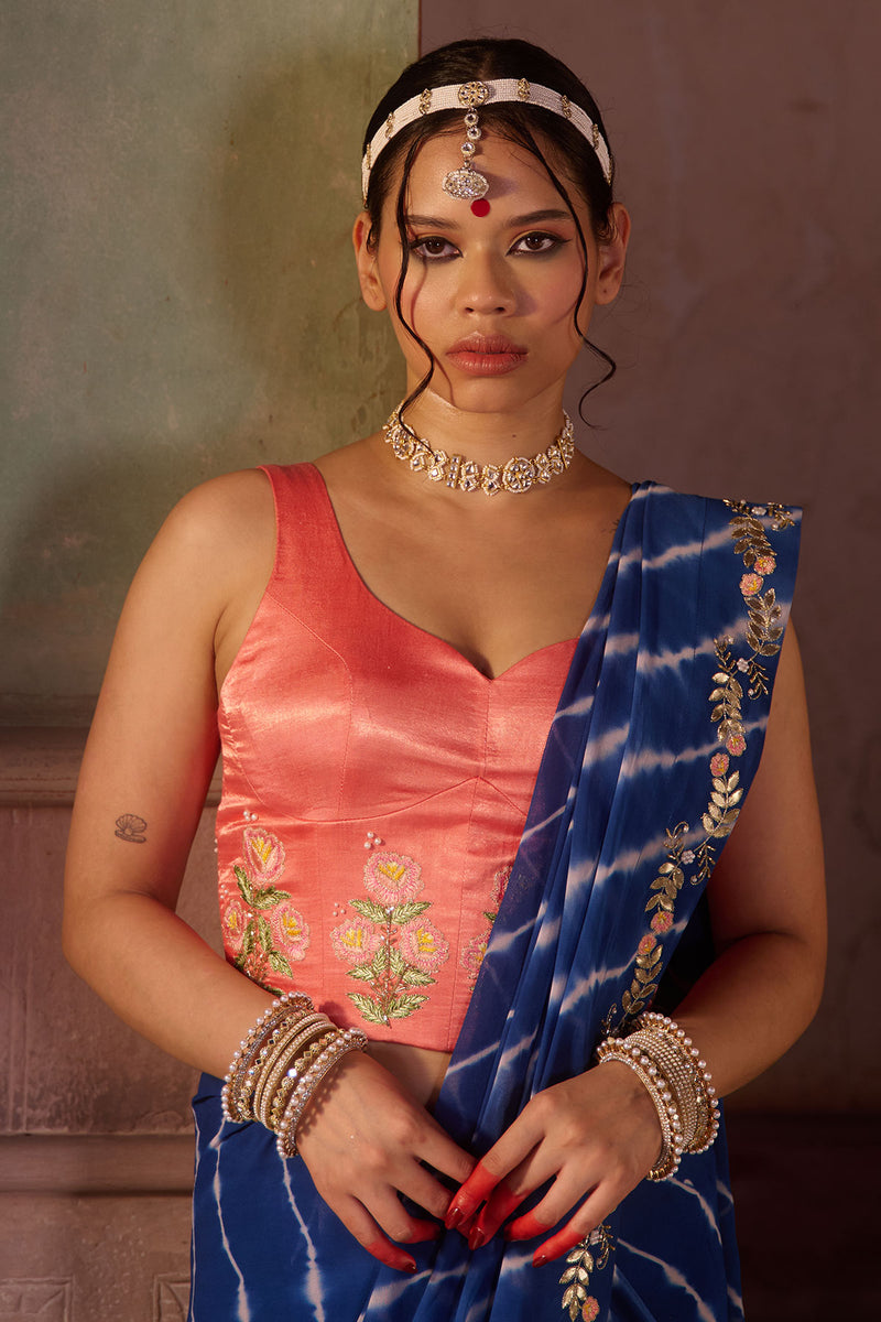 Roopmati – Navy Blue Leheriya Saree with Peach Corset Blouse