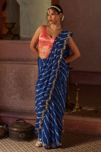 Roopmati – Navy Blue Leheriya Saree with Peach Corset Blouse