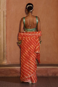 Palash – OrangeLeheriya Saree with Deep Sage Green Kaudi Blouse