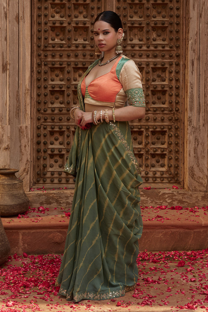 Gajgamini – Sage Green Leheriya Saree with Tri-Colour Panelled Blouse