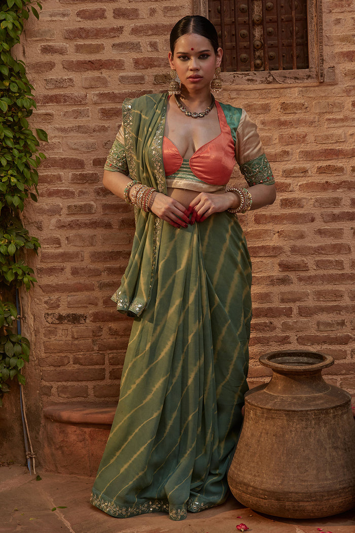 Gajgamini – Sage Green Leheriya Saree with Tri-Colour Panelled Blouse