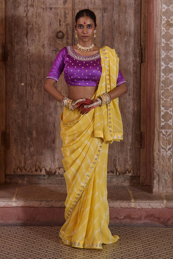 Roopmahal – Ray Yellow Leheriya Saree with Purple Maharani Gala Backless Blouse