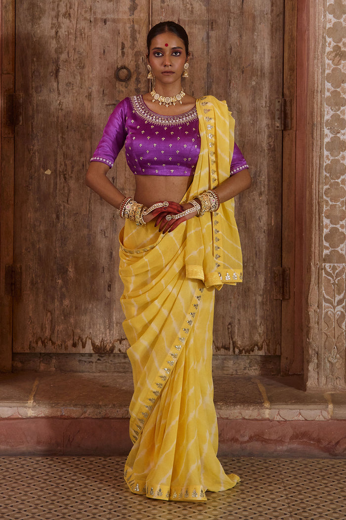 Roopmahal – Ray Yellow Leheriya Saree with Purple Maharani Gala Backless Blouse