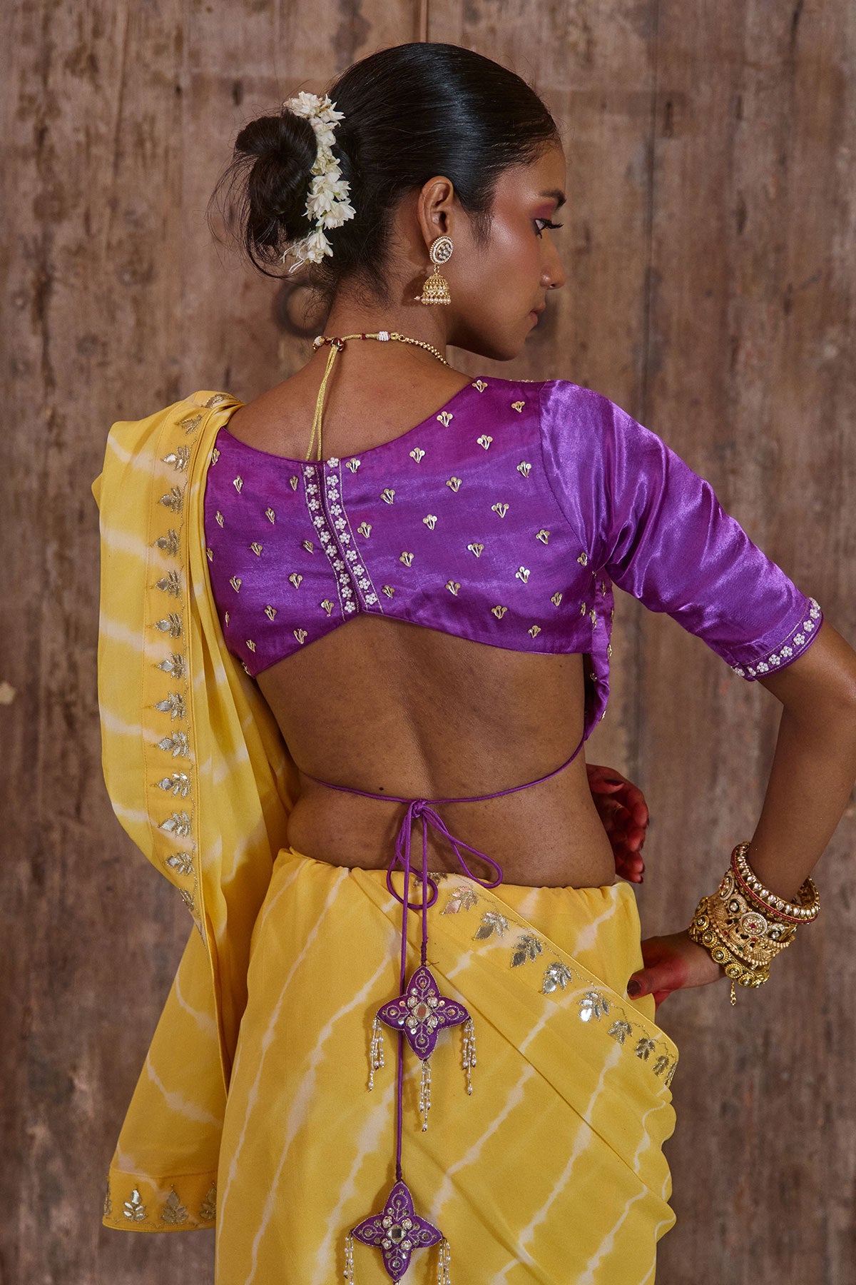Roopmahal – Ray Yellow Leheriya Saree with Purple Maharani Gala Backless Blouse