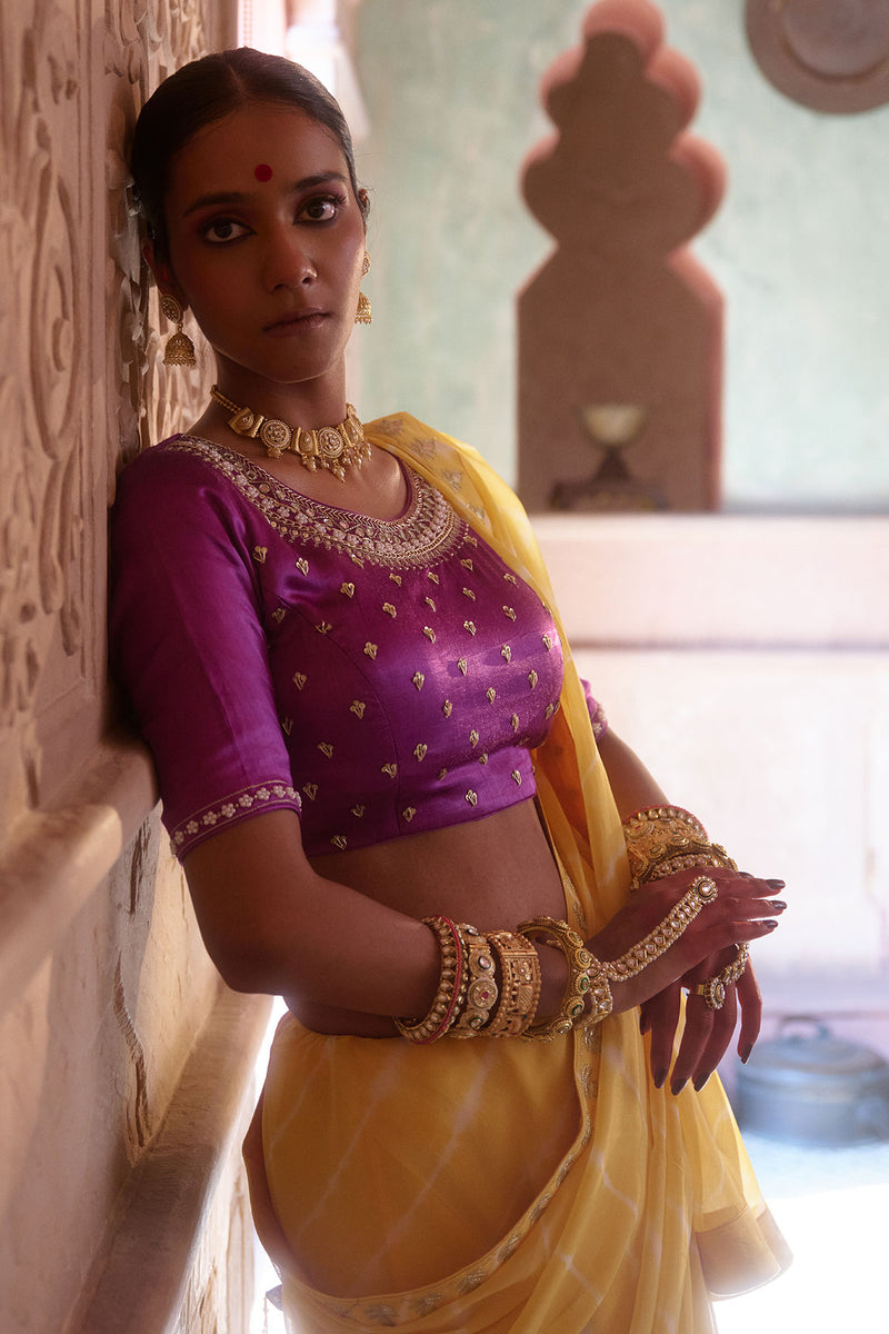 Roopmahal – Ray Yellow Leheriya Saree with Purple Maharani Gala Backless Blouse