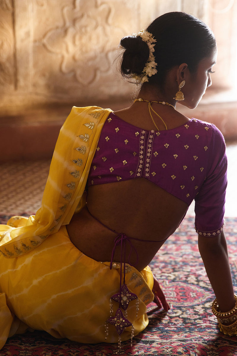 Roopmahal – Ray Yellow Leheriya Saree with Purple Maharani Gala Backless Blouse