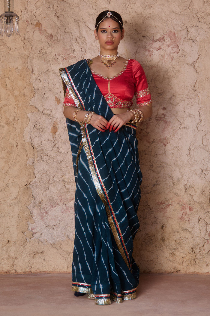 Utsavi – Bottle Green Leheriya Saree with Crimson Red Blouse
