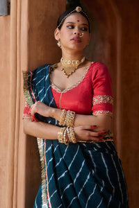 Utsavi – Bottle Green Leheriya Saree with Crimson Red Blouse