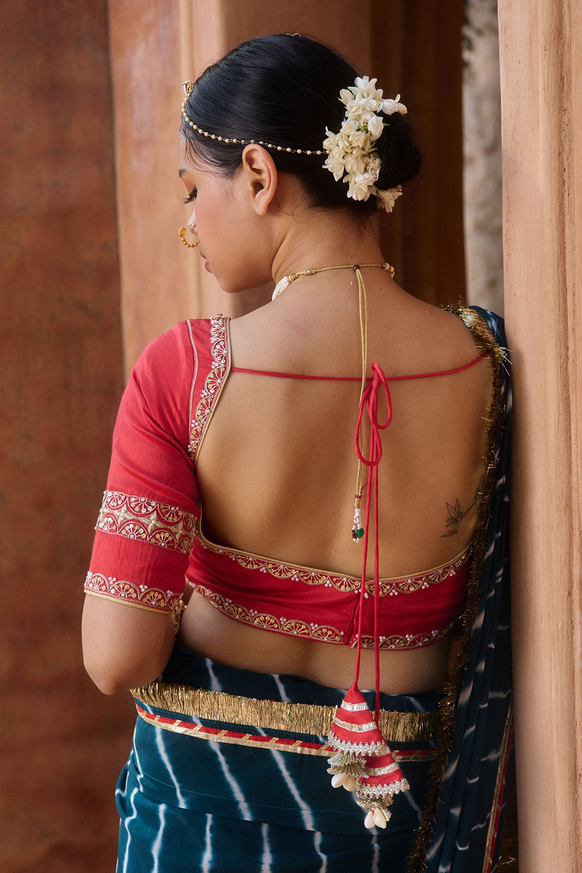 Utsavi – Bottle Green Leheriya Saree with Crimson Red Blouse