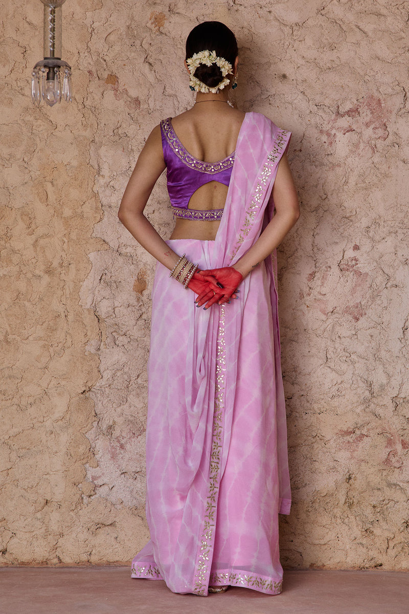 Ratnika – Lavender Pink Lehriya Saree with Bright Purple Sleeveless Blouse