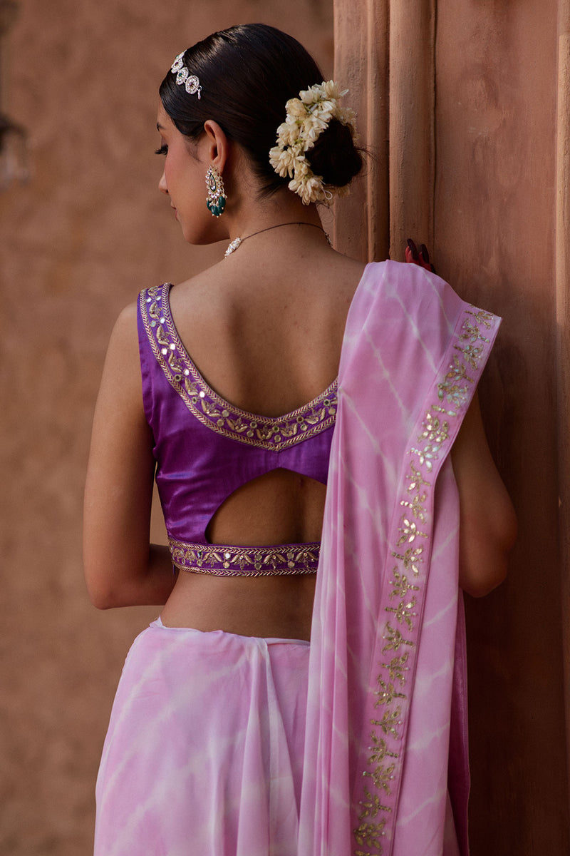 Ratnika – Lavender Pink Lehriya Saree with Bright Purple Sleeveless Blouse