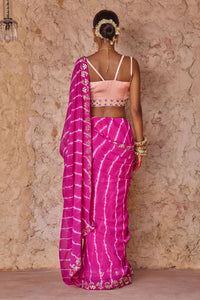 Raj Nikhar – Beetroot Purple Leheriya Saree with Light Peach Double Strap Blouse