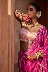 Raj Nikhar – Beetroot Purple Leheriya Saree with Light Peach Double Strap Blouse