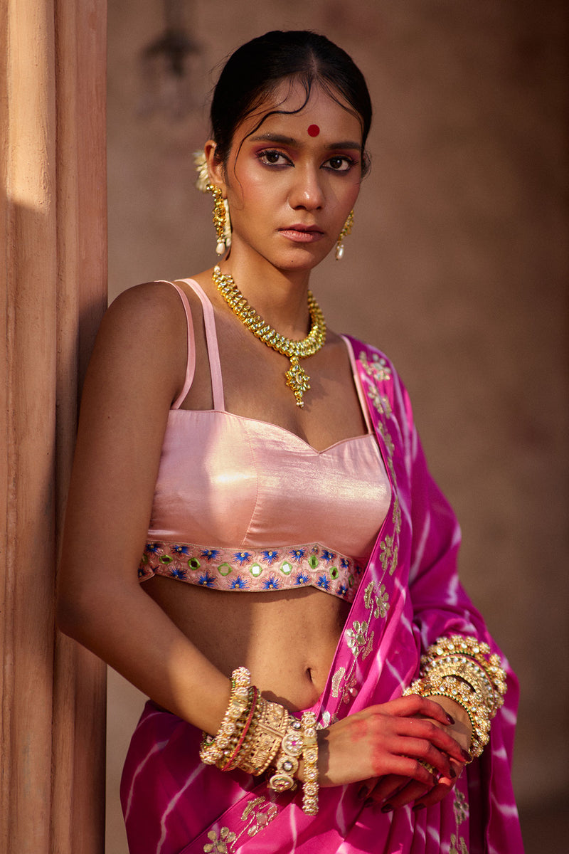 Raj Nikhar – Beetroot Purple Leheriya Saree with Light Peach Double Strap Blouse