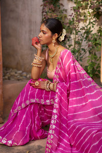 Raj Nikhar – Beetroot Purple Leheriya Saree with Light Peach Double Strap Blouse