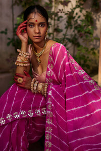 Raj Nikhar – Beetroot Purple Leheriya Saree with Light Peach Double Strap Blouse