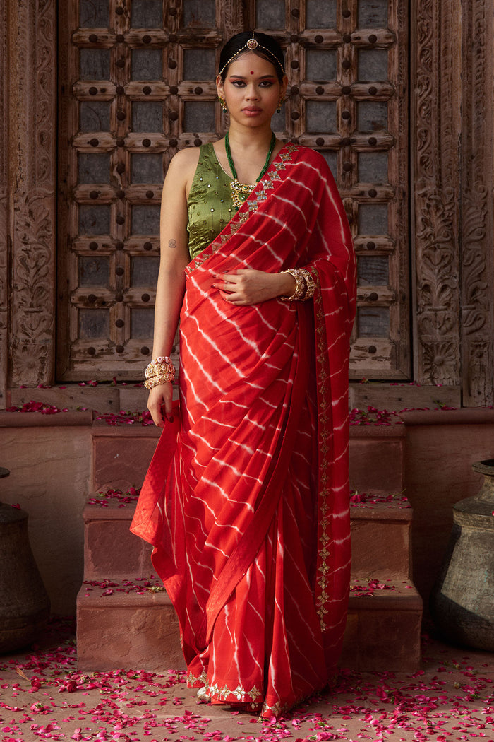 Rajbala – Red Leheriya Saree with Olive Green Blouse