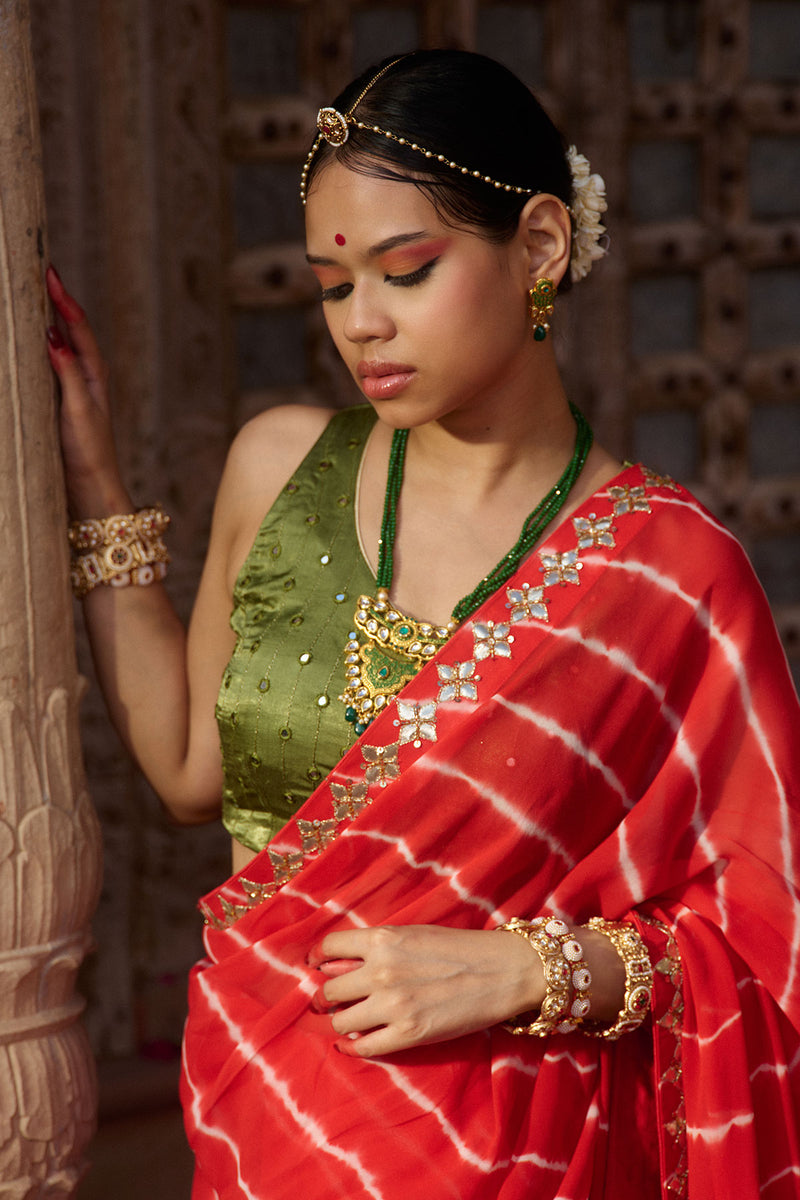 Rajbala – Red Leheriya Saree with Olive Green Blouse