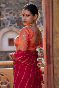 Charumati – Red Leheriya Saree with Light Orange Blouse