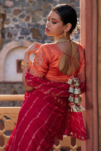Charumati – Red Leheriya Saree with Light Orange Blouse