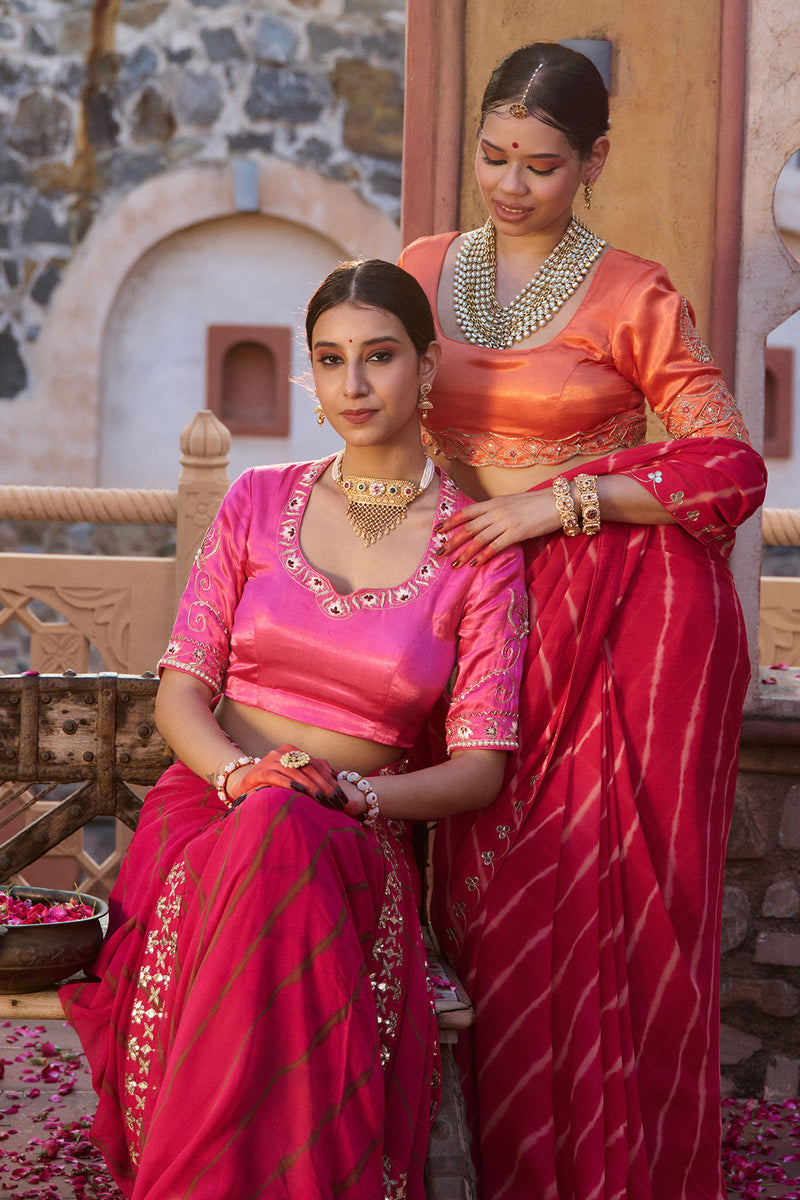 Charumati – Red Leheriya Saree with Light Orange Blouse