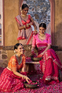 Rajeshwari – Sand Brown Leheriya Saree with Crimson Corset Blouse