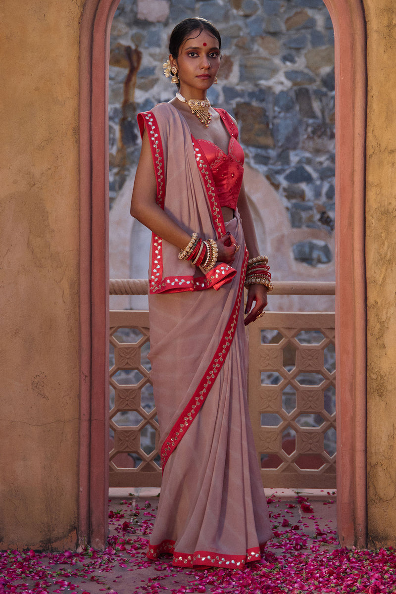 Rajeshwari – Sand Brown Leheriya Saree with Crimson Corset Blouse