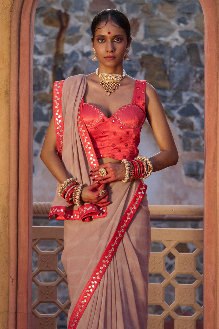 Rajeshwari – Sand Brown Leheriya Saree with Crimson Corset Blouse