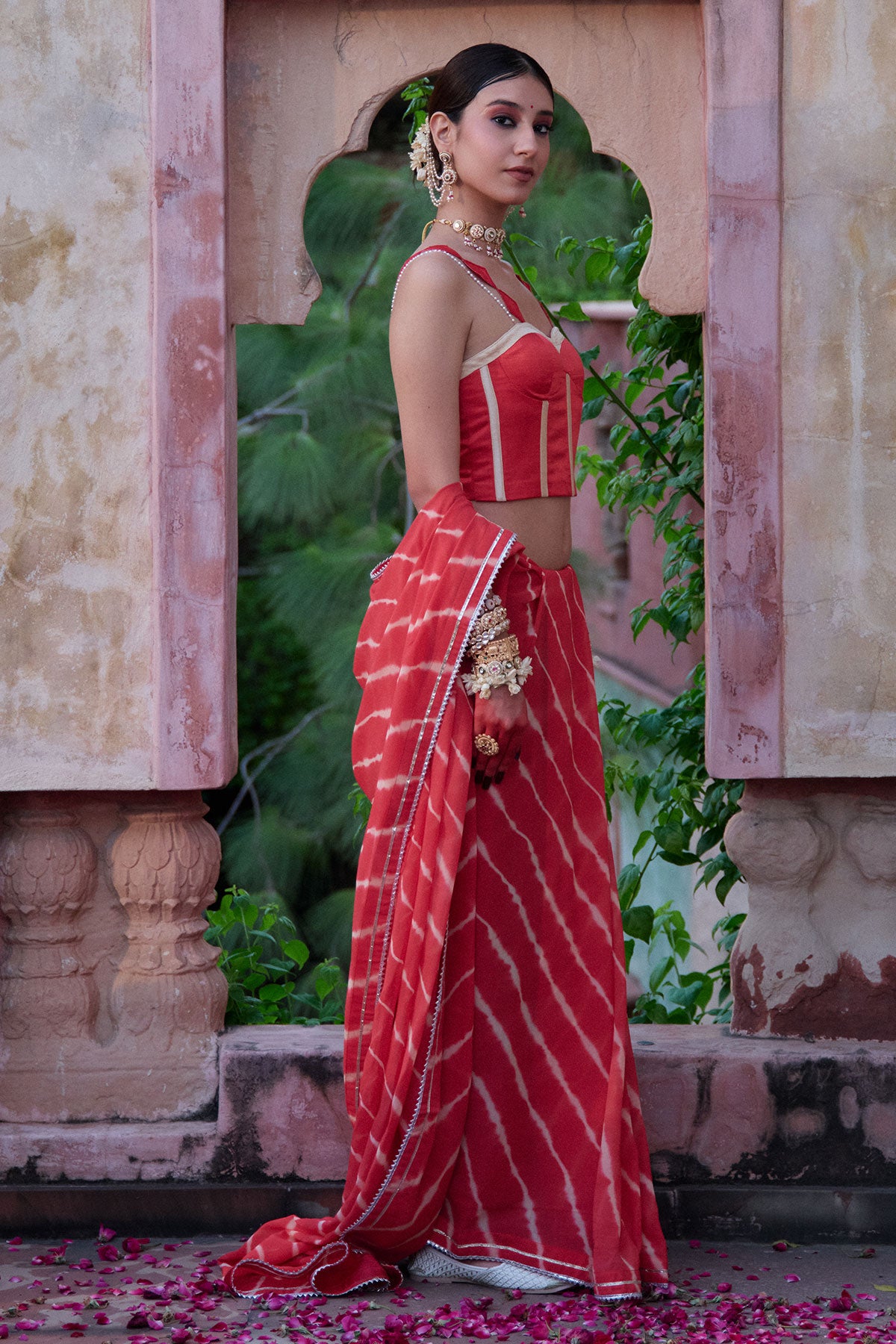 Tarangini – Watermelon Leheriya Saree and Corset Blouse with Pearl Strings