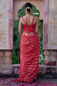 Tarangini – Watermelon Leheriya Saree and Corset Blouse with Pearl Strings
