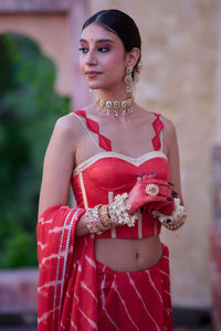 Tarangini – Watermelon Leheriya Saree and Corset Blouse with Pearl Strings