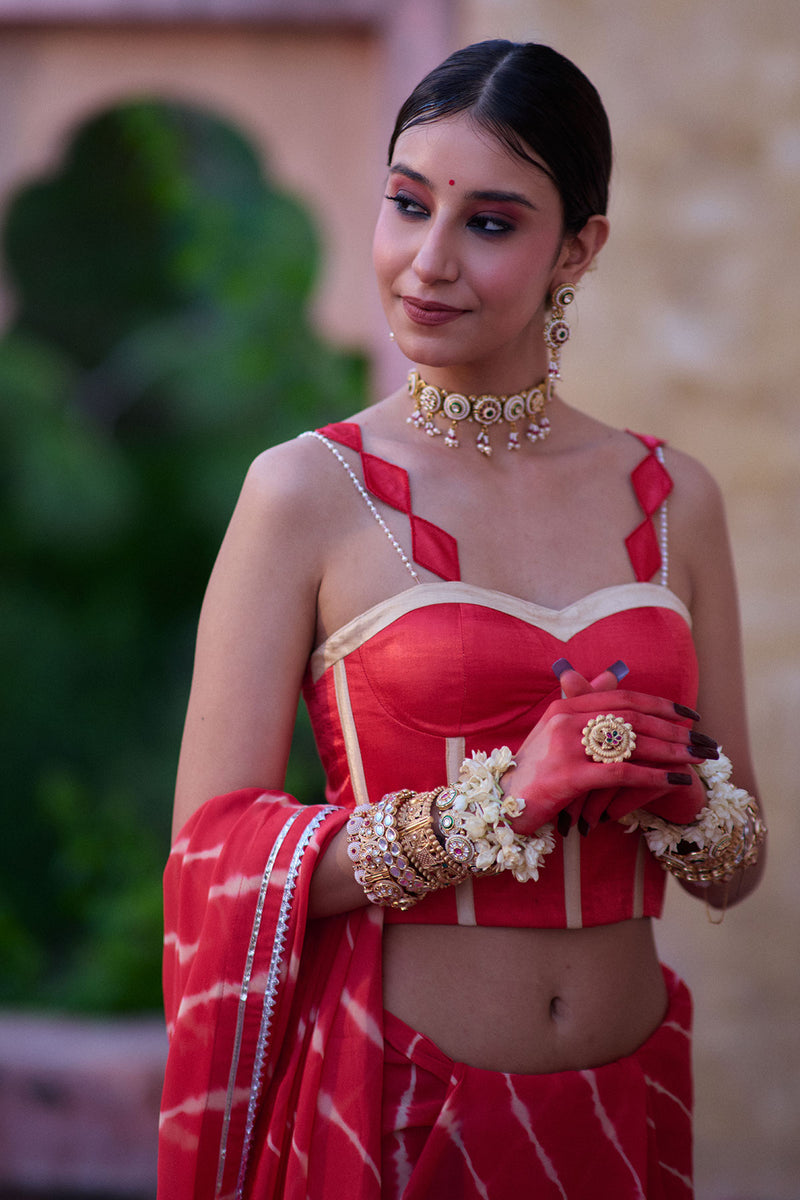 Tarangini – Watermelon Leheriya Saree and Corset Blouse with Pearl Strings