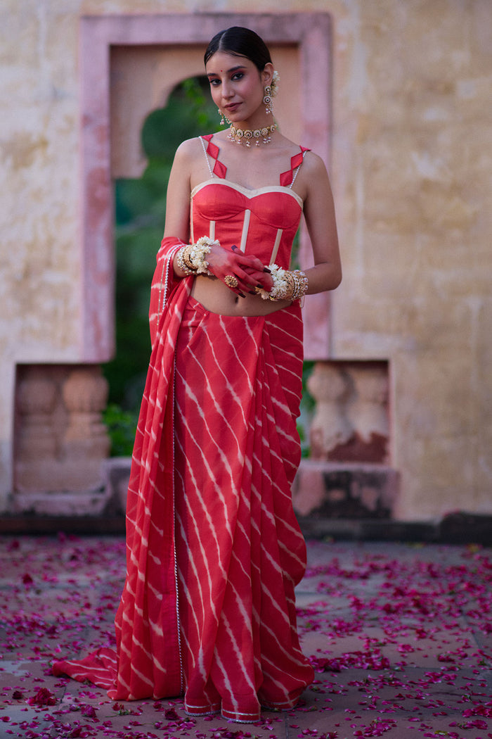 Tarangini – Watermelon Leheriya Saree and Corset Blouse with Pearl Strings